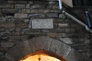 The first Gate of Santo Stefano with the plaque