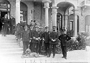 Officers in front of the entrance to the Villa
