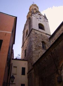 The bell tower seen between the church and the Baptistery